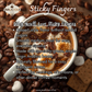 Javalicious Coffee's 'Sticky Fingers' with a cup of coffee and coffee beans, Why You'll Love Sticky Fingers